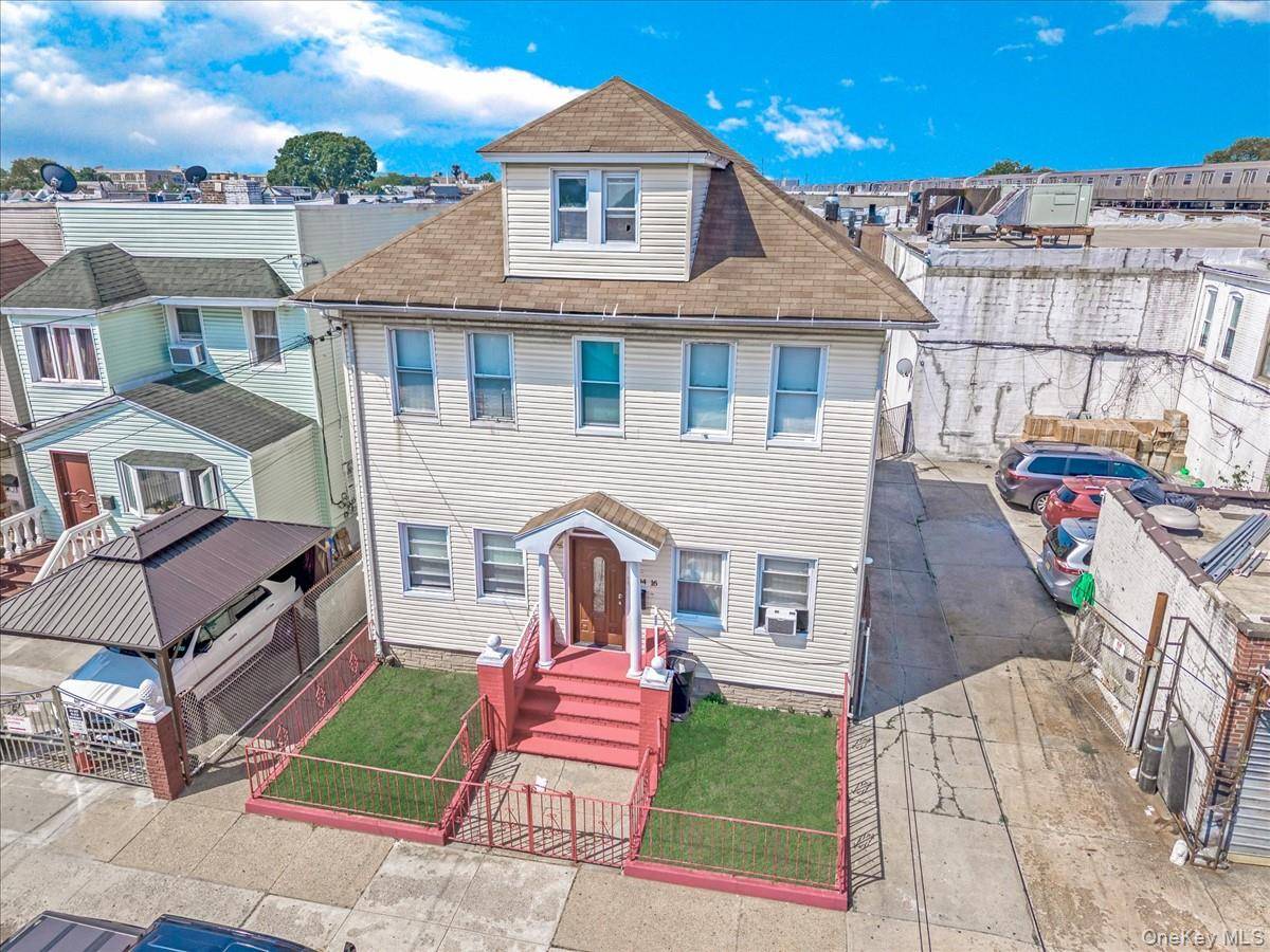 Oversized 2 Family Home with Massive Garage amp ; Private Parking Prime Location !