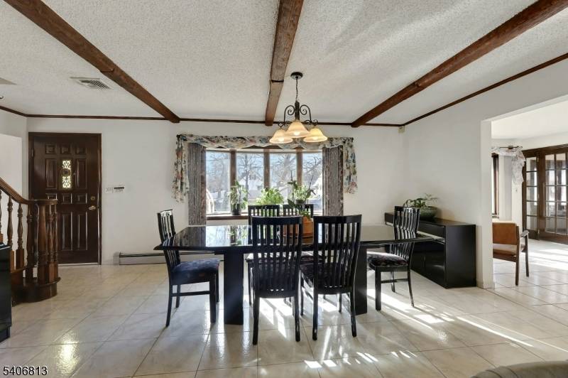 Welcome to this spacious and versatile 5 bedroom, 3 full bath Colonial set on a generous corner property entering a coveted cul de sac in Wayne.