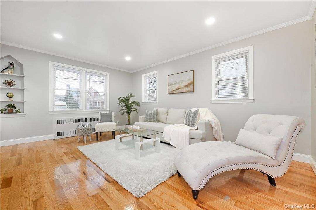 Welcome to this beautifully renovated 4 bedroom, 2 full bath Expanded Cape in the heart of West Hempstead.