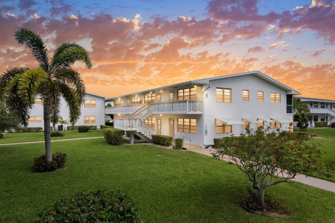 GORGEOUS 2nd FLOOR CONDO PRESTIGIOUS GATED 55 COMMUNITY OF CENTURY VILLAGE NEW 2024 ROOF Bright Open Floor Plan LED Custom Lighting Eat In Kitchen Serving Window White Wood Cabinets Pantry ...