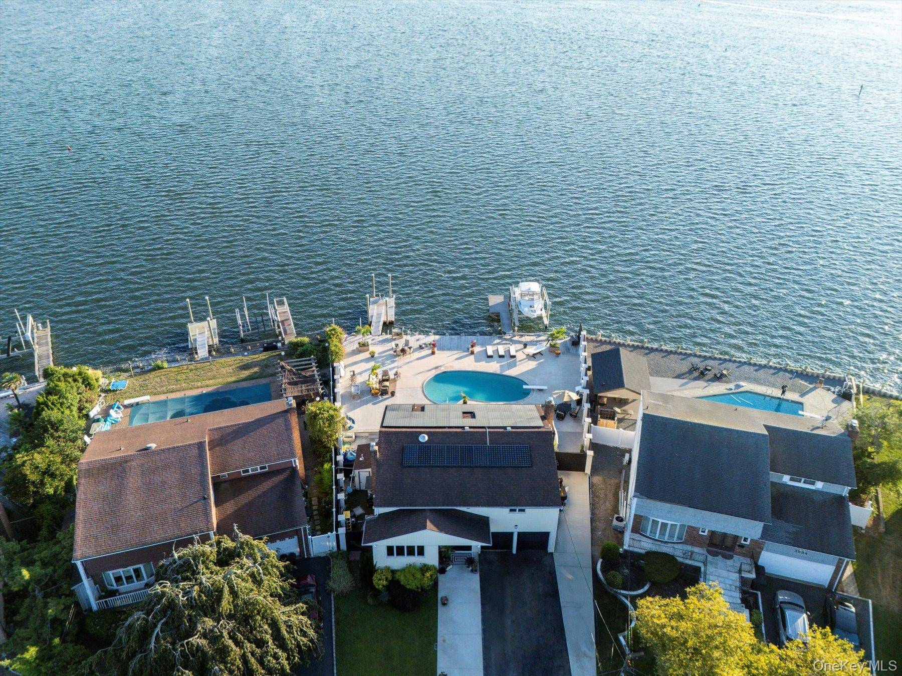 Welcome to one of Baldwin Harbor s most extraordinary waterfront properties an outdoor enthusiast s dream and a rare opportunity to own a truly one of a kind coastal retreat.