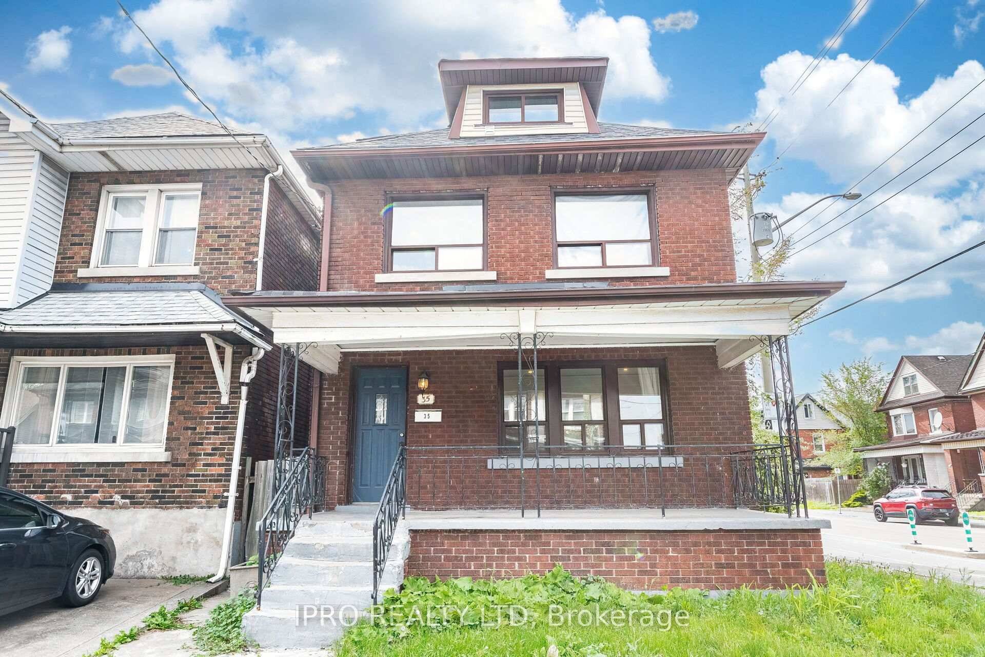 Must See Four Bedroom Detached Brick Home with Double Car Garage on Corner Lot !