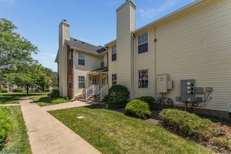 Welcome to this beautifully maintained and rare First Floor Elm Model limited number of these units with a full basement, offering the perfect blend of comfort, privacy, and convenience.