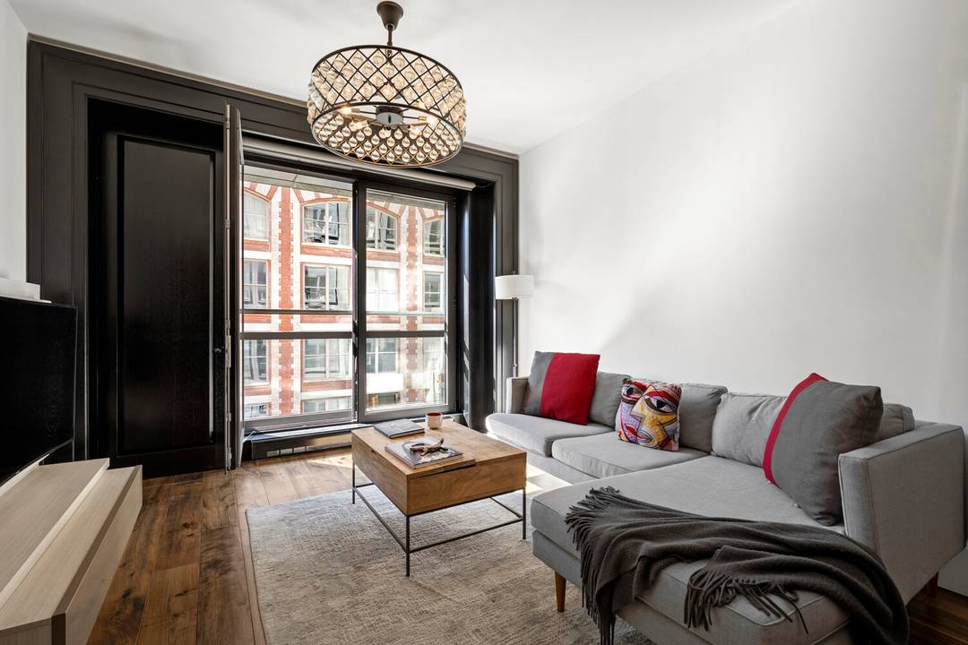 Gorgeous South facing one bedroom condominium in the heart of Chelsea facing landmarked Carriage houses.