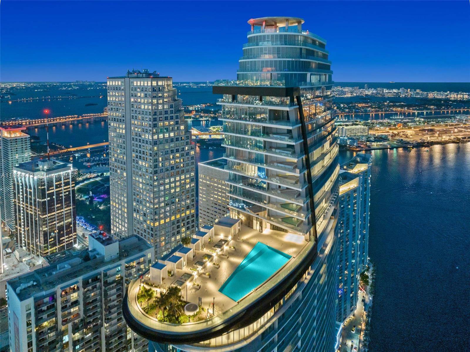 Spanning 1, 437 sq ft, this elegant home features a split floor plan, sophisticated interiors, and breathtaking views of Downtown Miami's skyline and architectural landmarks.