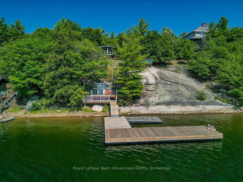 Drive in or sail in, unwind, lock up and go Georgian Bay cottage life done right.