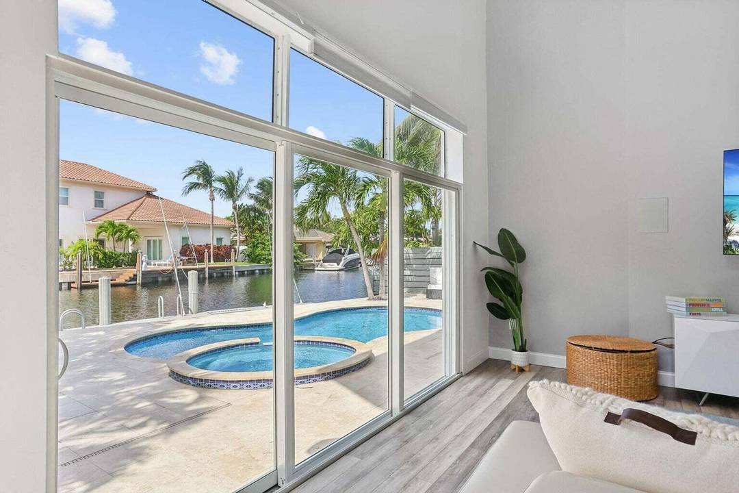 Step into the pinnacle of waterfront luxury with this stunningly renovated home in East Boca Raton.