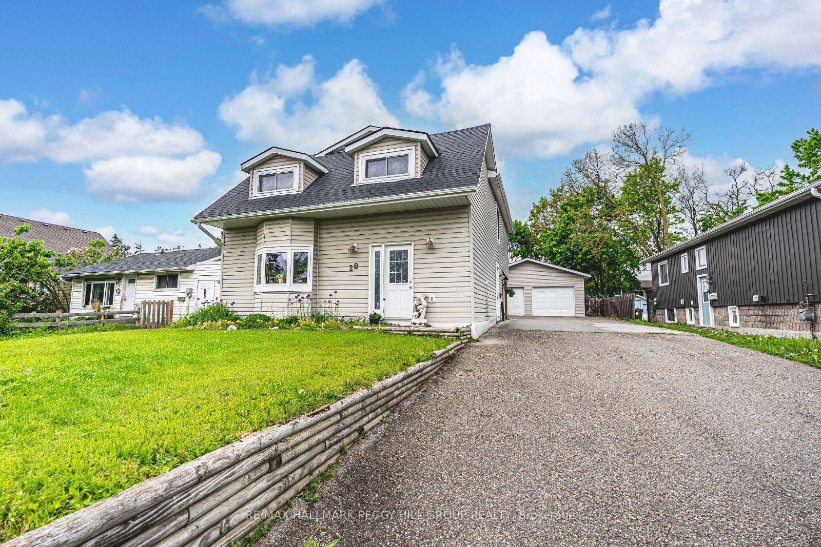 SPACIOUS FAMILY HOME SHOWCASING OVER 2, 000 SQ FT ABOVE GRADE WITH A DETACHED HEATED 2 CAR GARAGE IDEAL FOR HOBBYISTS !