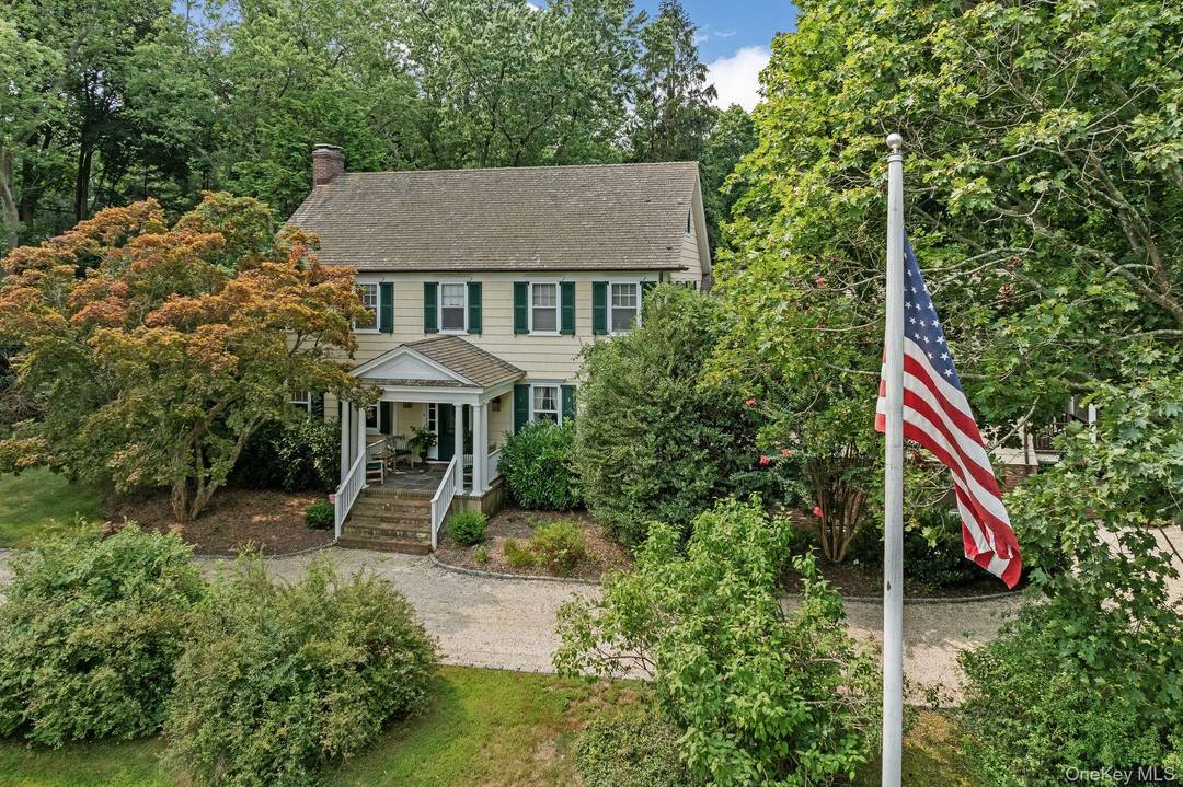 Set on just over two serene acres in the Village of Lloyd Harbor, 1 Beardsley Lane is a classic Colonial that combines timeless character with modern amenities.