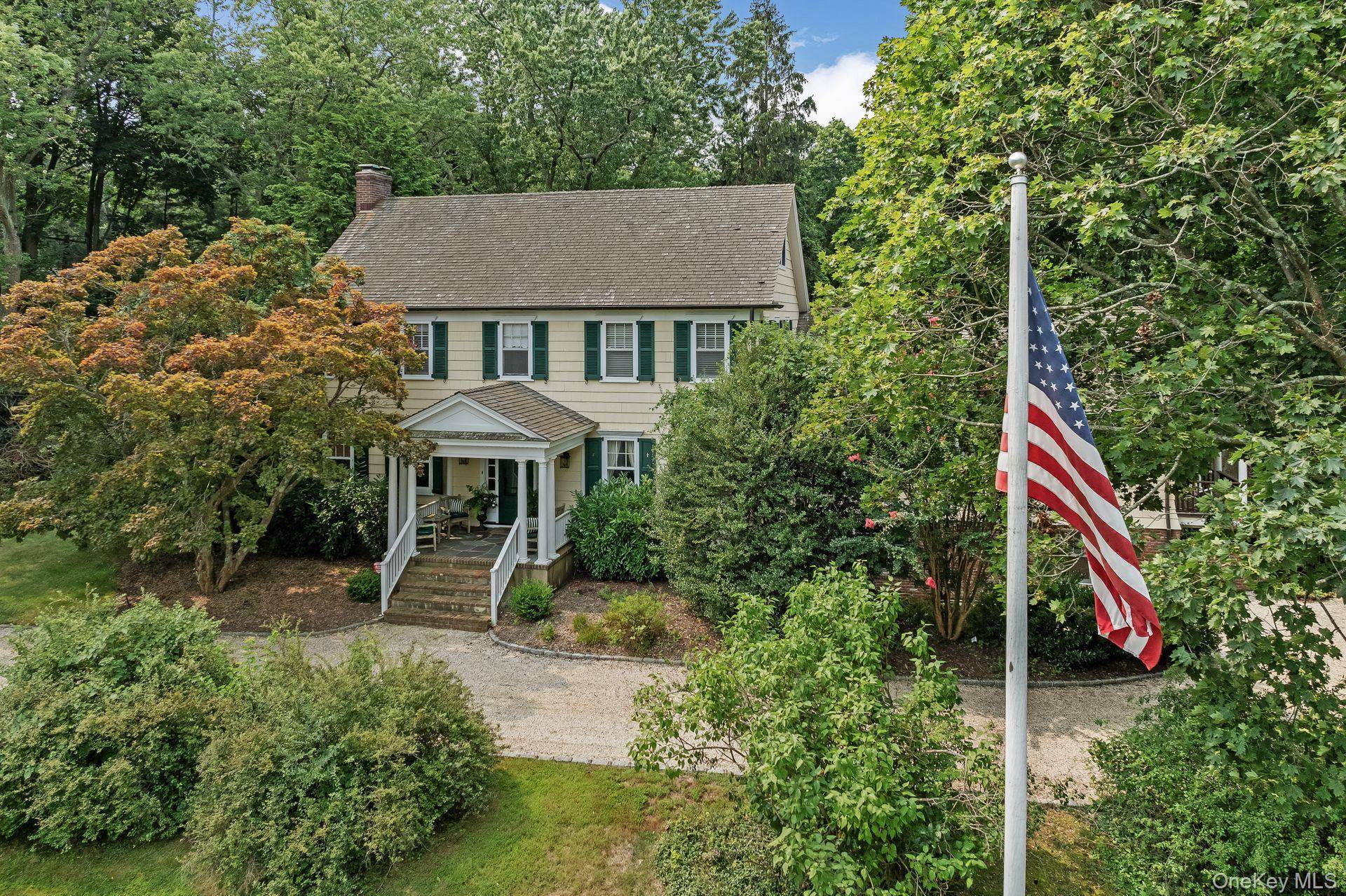 Set on just over two serene acres in the Village of Lloyd Harbor, 1 Beardsley Lane is a classic Colonial that combines timeless character with modern amenities.