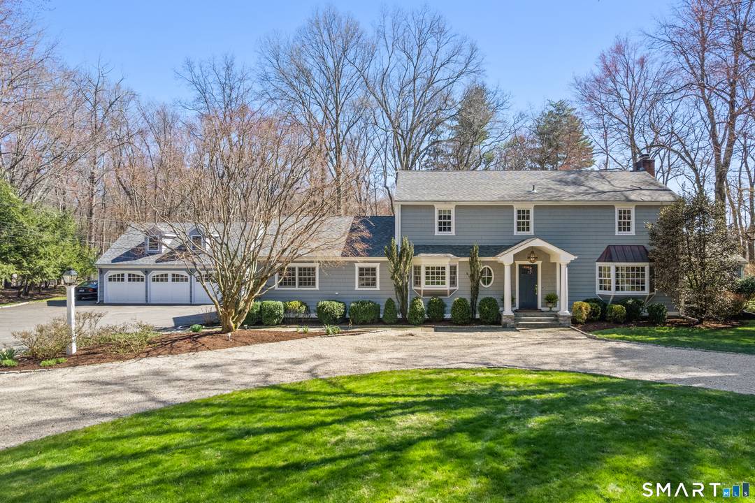This is the One ! A beautifully updated four bedroom Colonial set on a quiet street in coveted North Darien, offering the perfect blend of classic charm and modern living.