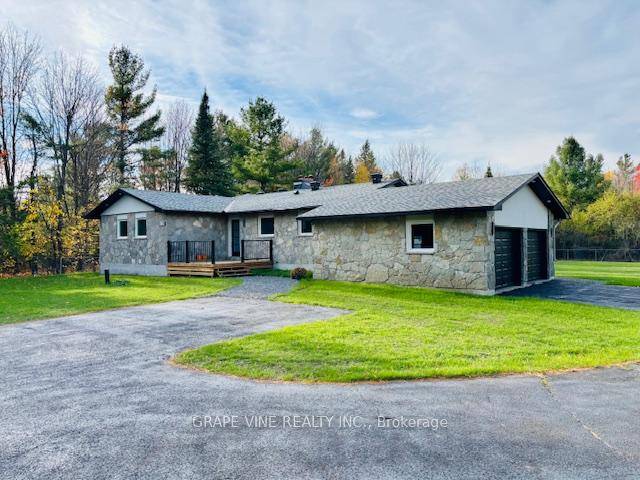 Escape to your private country oasis on OVER 2 acres minutes from Stittsville !