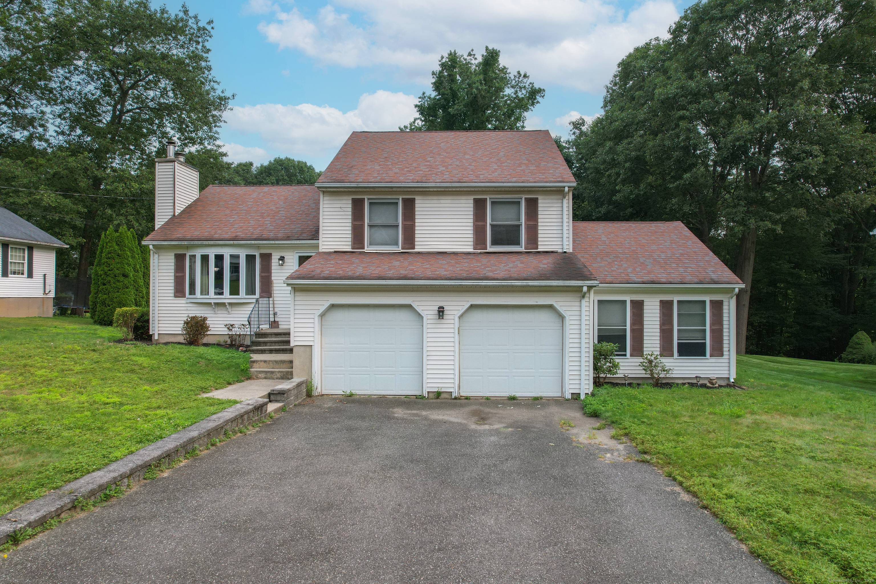 Welcome to this well maintained four bedroom split level home located on a quiet cul de sac in one of Watertown's most desirable neighborhoods.