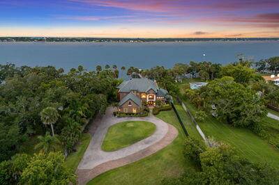 Tucked on 2. 86 acres with 118' of deep Intracoastal frontage, this private Merritt Island estate offers rare scale, seclusion, and water access.