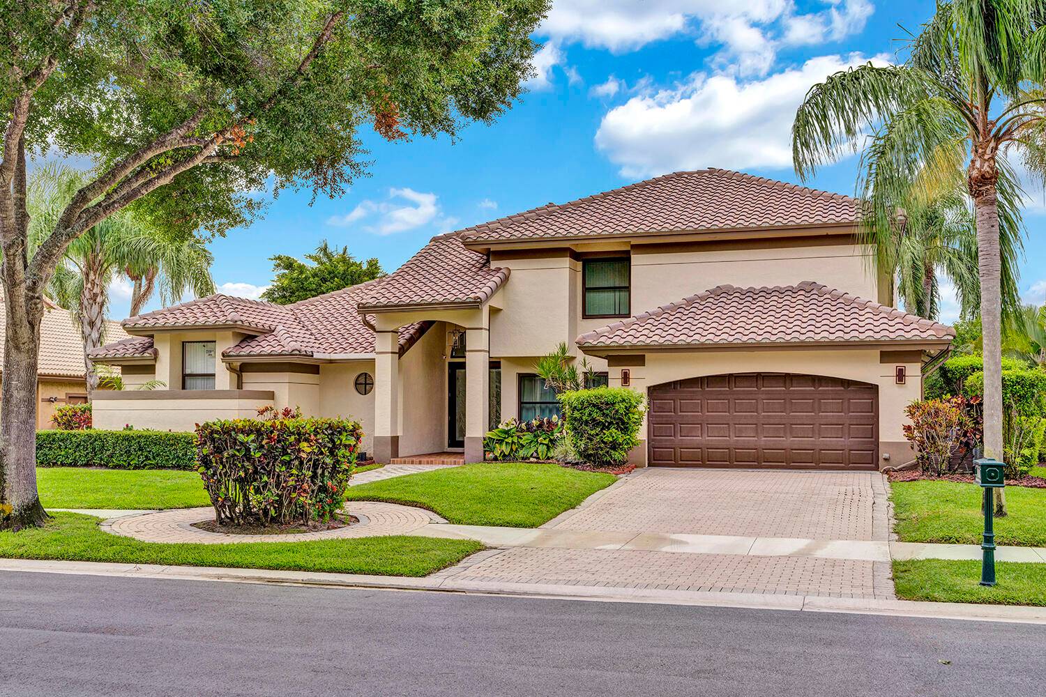 Beautifully updated 4 bedroom, 4 bath home in The Isle of Mission Bay with serene lake views.