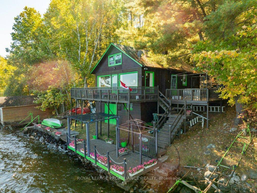 A quaint waterfront cottage offers a setting that has been cherished by generations on beautiful Mazinaw Lake, the home of the famous Bon Echo Rock.