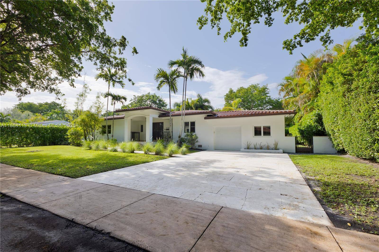 Located east of US 1 in coveted Coral Gables, this elegant residence sits on a manicured 10, 000 sq ft lot with timeless curb appeal and privacy.