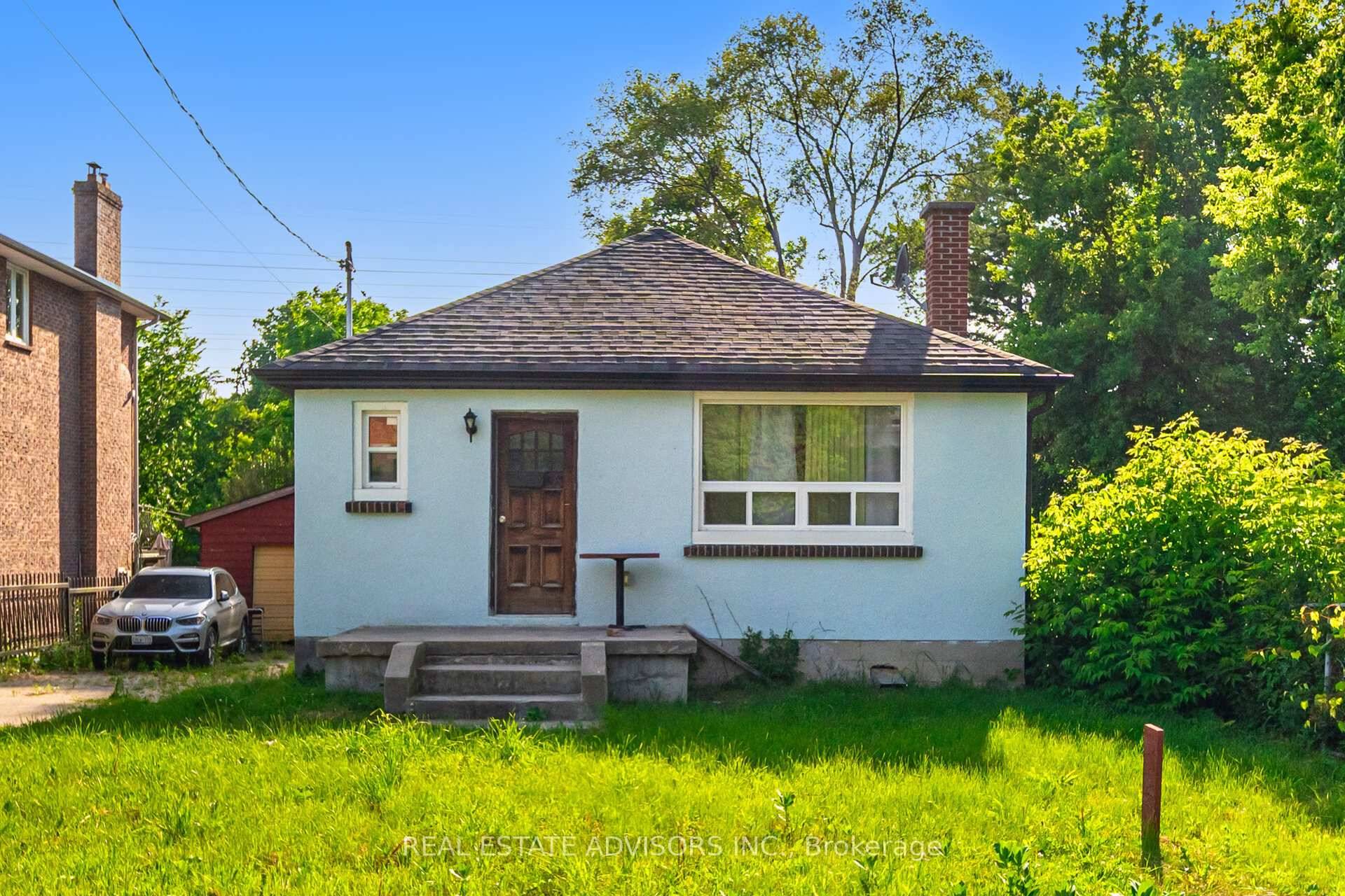 Nestled along the serene Mimico Creek and adjacent to Jeff Healey Park, this charming detached stone bungalow sits on a spacious 50 ft x 150 ft lot.