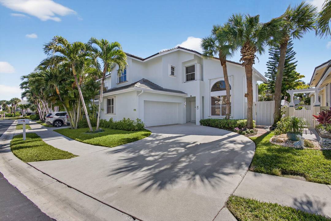 Highly sought after Sea Colony, this big dog friendly residence sits across the street from the famous Jupiter Dog Beach.