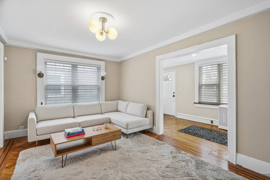 Located on a quiet, tree lined block in the heart of Forest Hills, this well maintained 3 bedroom, 2.