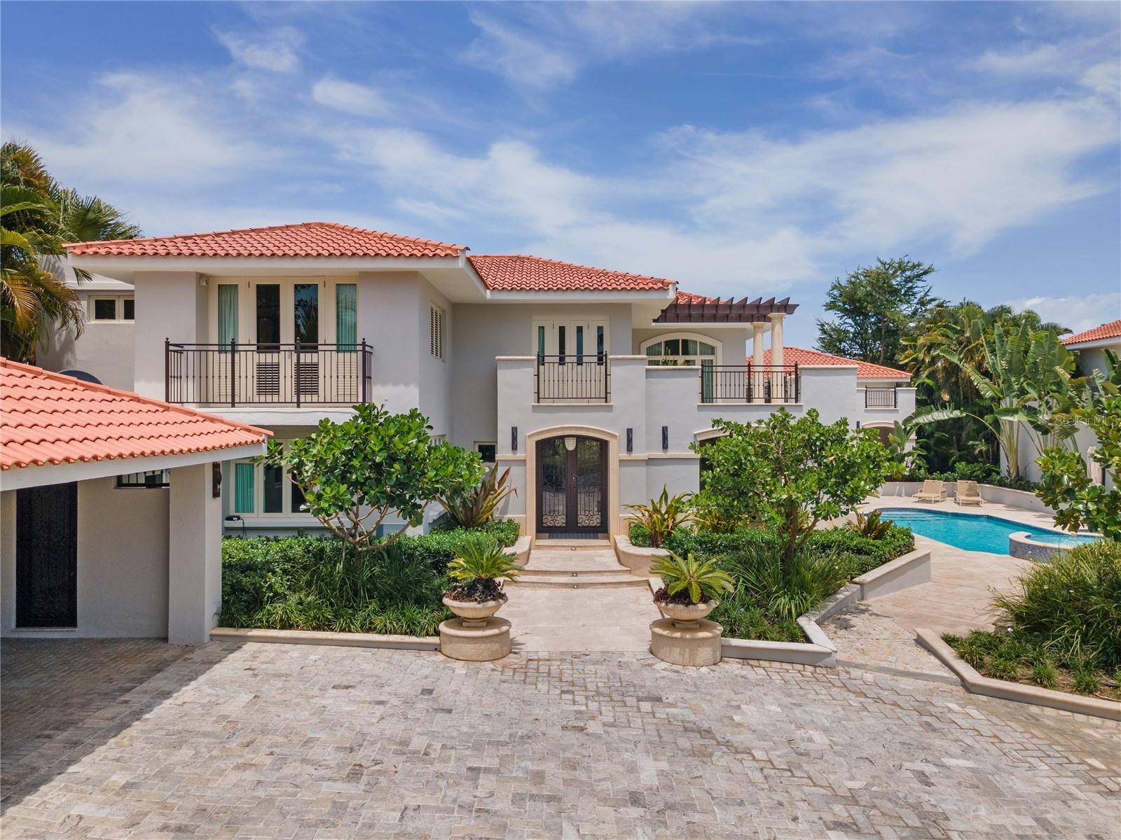 Located in the highly sought after Dorado Beach East, this classic contemporary residence offers an elegant layout designed for comfortable living and effortless entertaining.