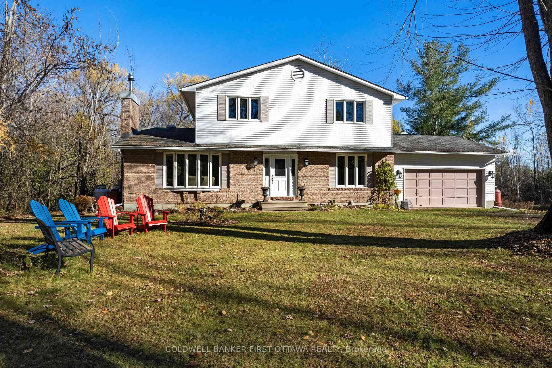 Family home in the country, on 23 acres with two meandering creeks just 25 mins from Kanata.