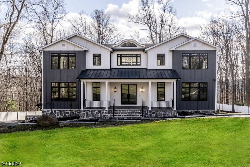 This completely rebuilt custom colonial offers an unparalleled combination of modern sophistication and timeless design.