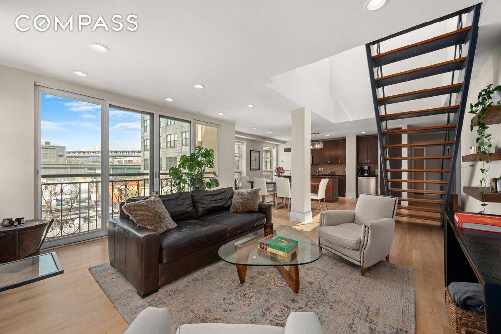 Welcome to Penthouse 704 at 57 Front Street a corner 2 bedroom, 2 bathroom loft with direct apartment access to your private roof terrace !
