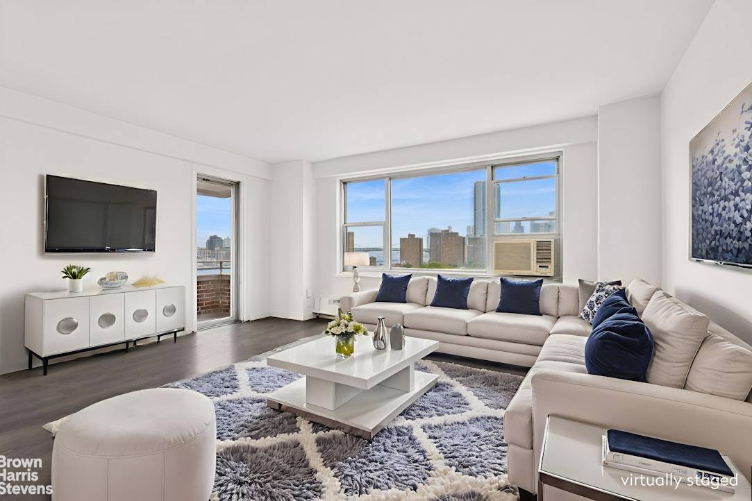 2BR BALCONY WITH STUNNING VIEWS High floor outside corner apartment with open city and river views from every room !
