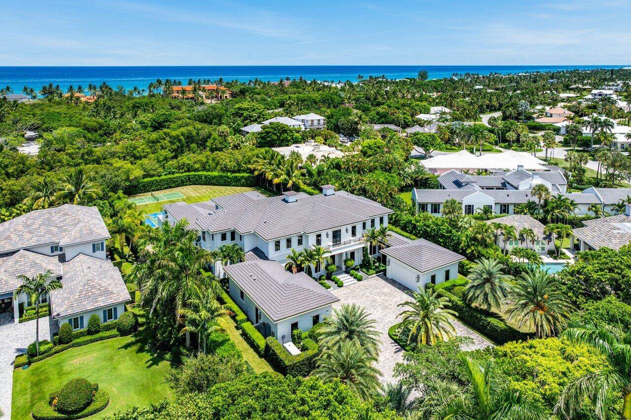 A one of a kind masterpiece in prestigious Seminole Landing, this ultra custom estate blends timeless elegance with modern innovation.