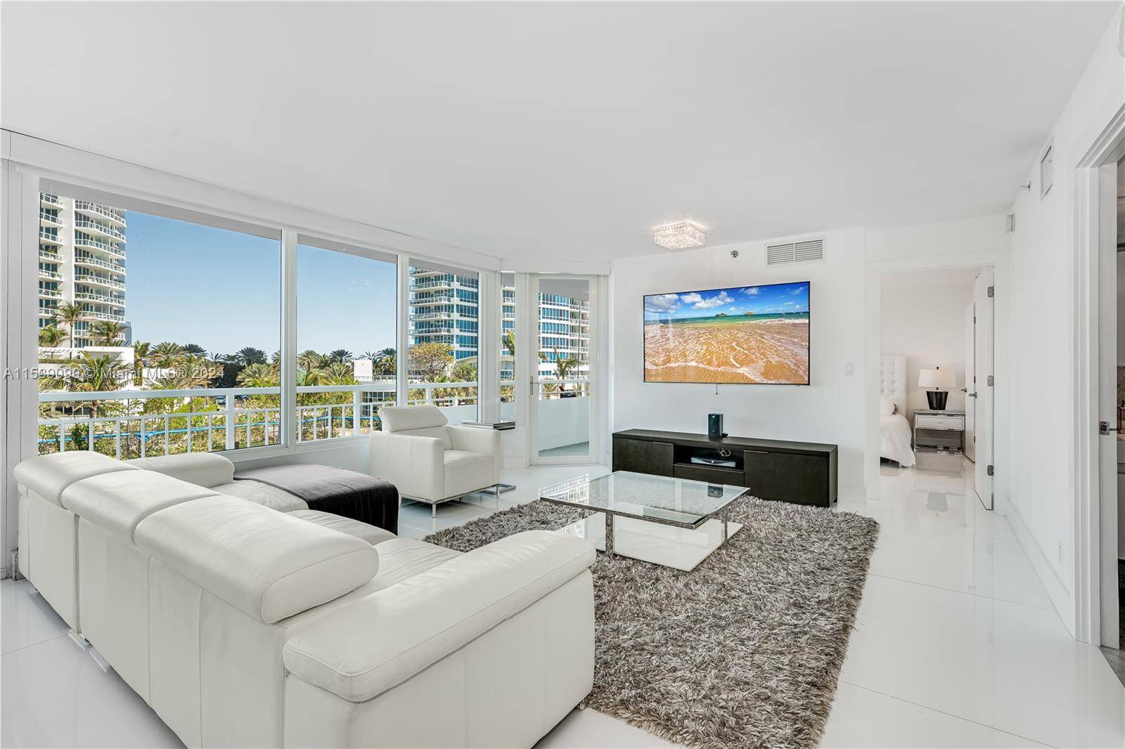 Tastefully renovated apartment in full amenity doorman building in prestigious South of Fifth SoFi neighborhood.
