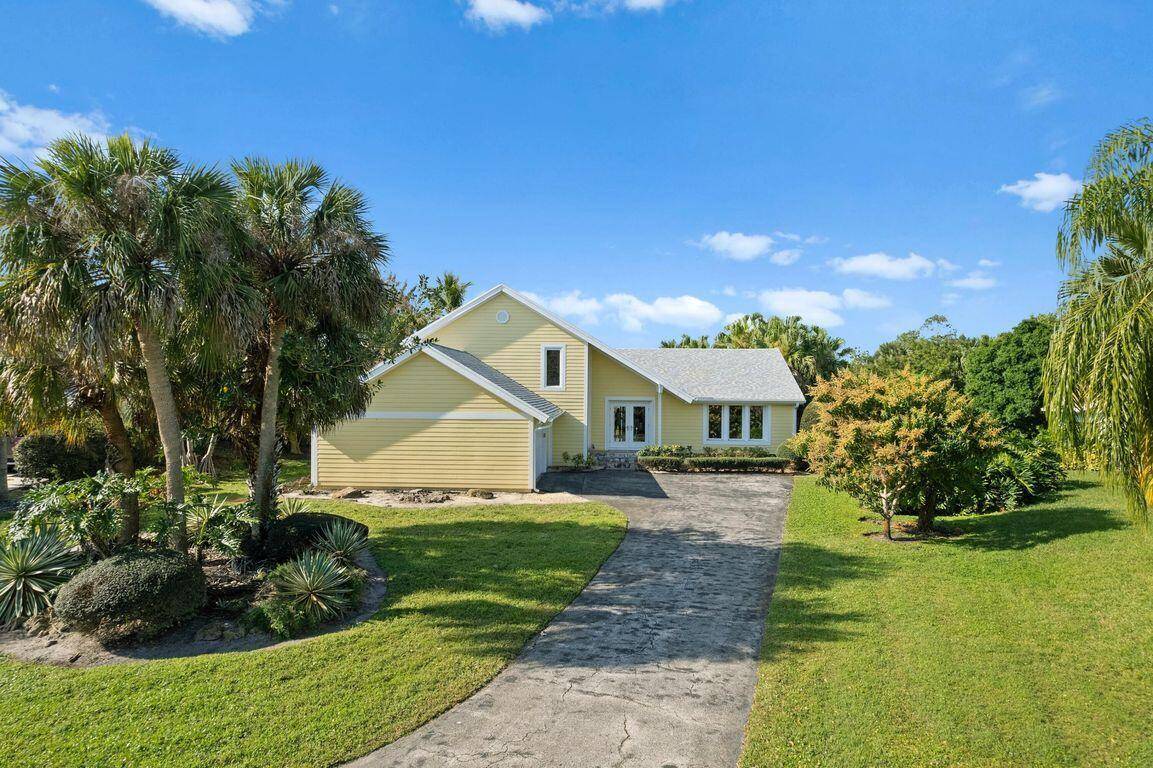Florida living at its finest with this 4 bedroom, 3 bath waterfront pool home with a private dock in the sought after community of Vikings Landing.