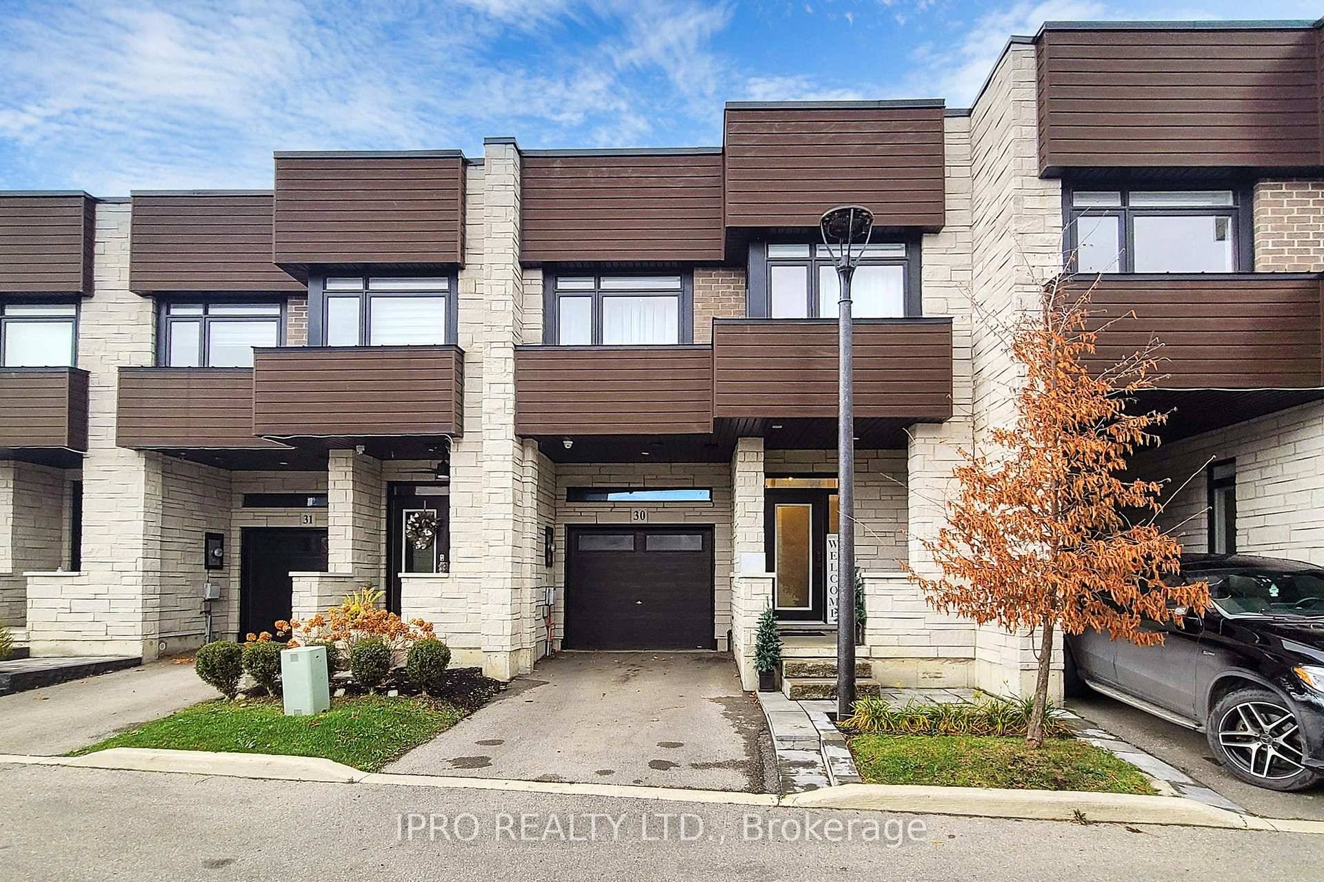 This exquisite executive townhome features 3 bedrooms and 4 bathrooms, combining modern luxury with functionality.