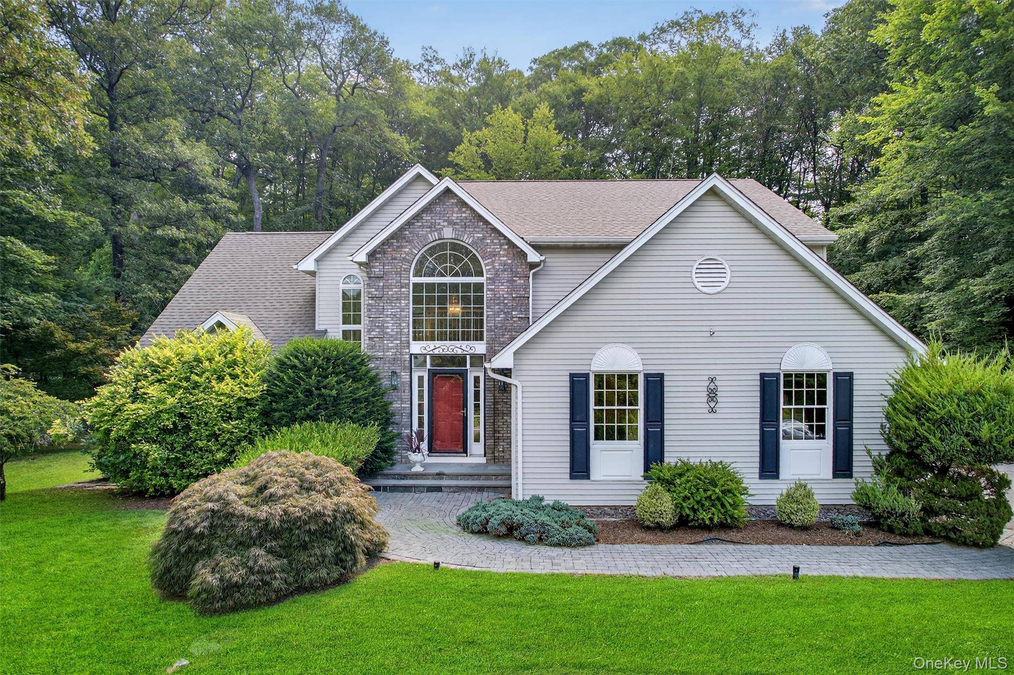 Experience refined living in Tuxedo Park s coveted Table Rock Estates with this elegant 4 bed, 2.