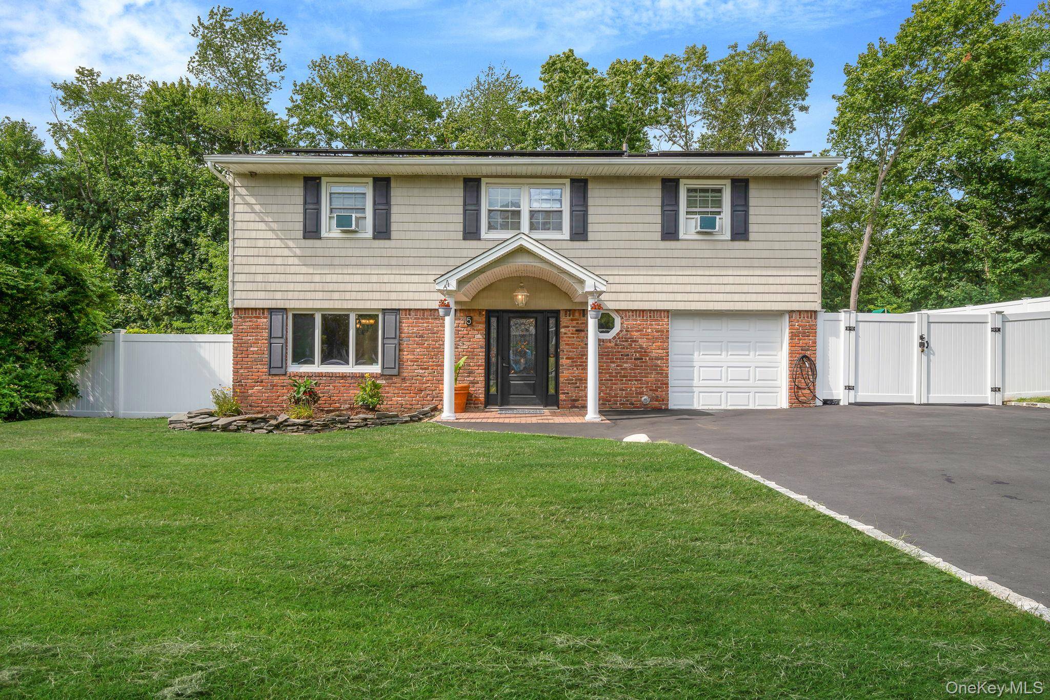 Welcome to 5 Montrose a classic Splanch style colonial located on a peaceful cul de sac in East Northport.