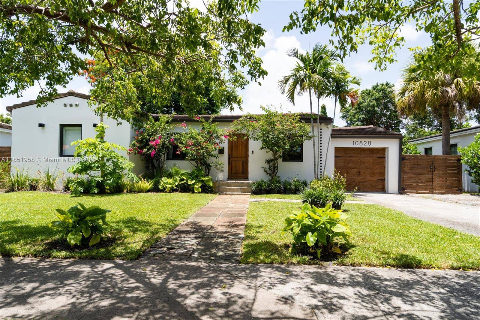Welcome to this peaceful, Zen inspired tropical home, nestled on an expansive 8, 750 sq ft lot with lush landscaping and a garden ready for your own farm to table ...