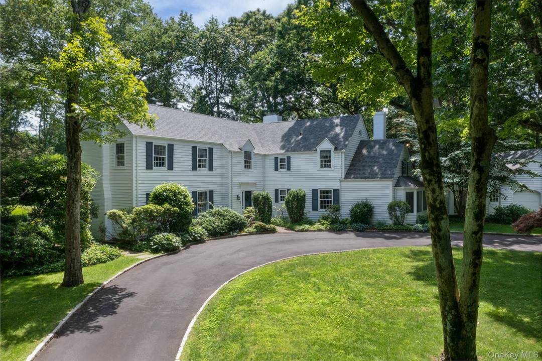 Welcome to this charming Center Hall Colonial, perfectly situated on flat, verdant property just moments from the Town of Huntington and the picturesque Village of Cold Spring Harbor.