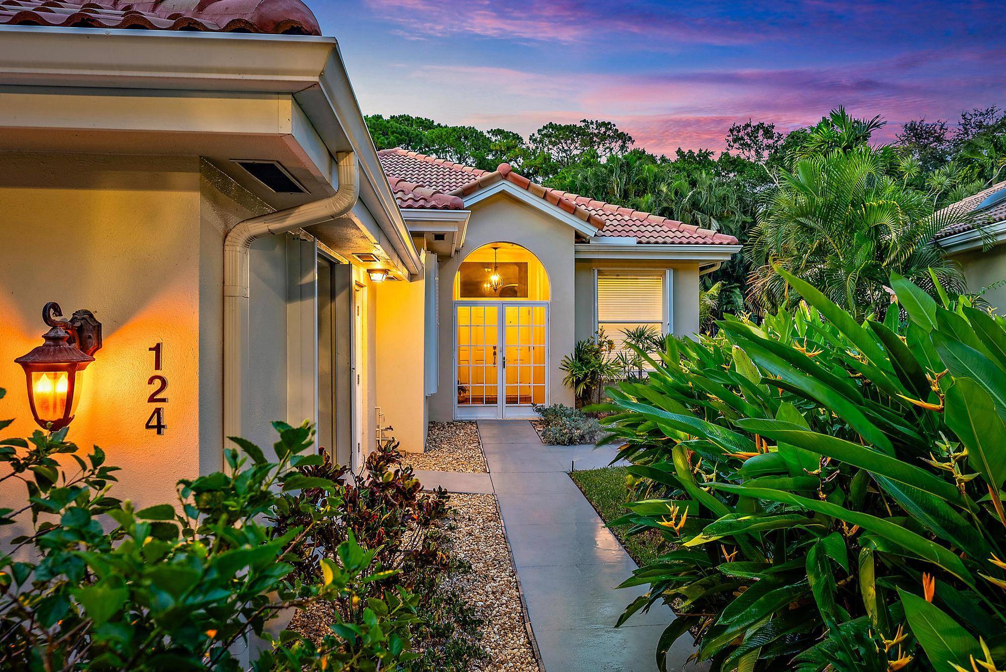 Welcome to this beautifully maintained DiVosta built home in the desirable Hamptons at Maplewood, nestled in the heart of Jupiter.