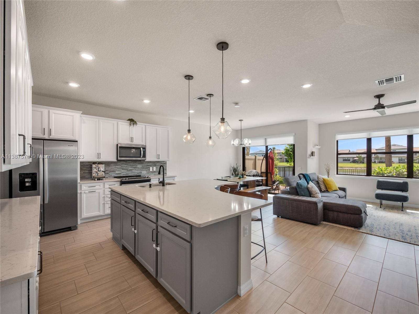 Beautiful waterfront home in sought after, newer construction, luxury community of The Fields.
