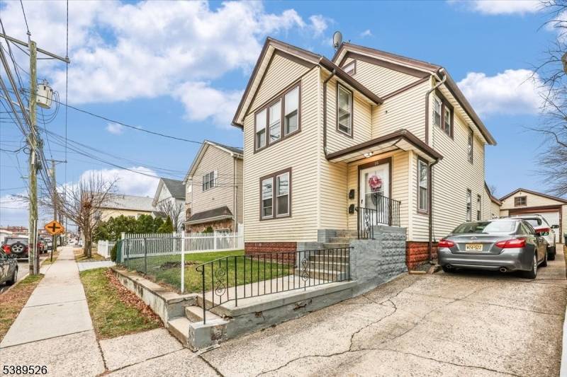 This oversized, sun filled two family property offers versatility and value with a 3 bedroom, 1.