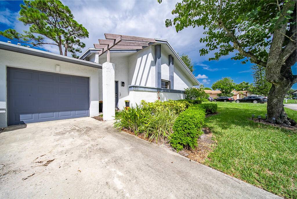55 community ! This updated corner villa features 2 bedrooms, 2 bathrooms, and a 1 car garage, all within 1, 188 square feet of move in ready living space.