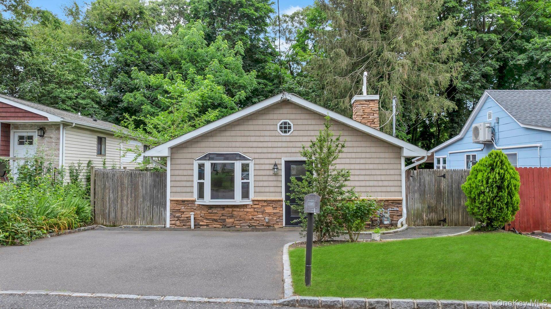 Welcome to this picture perfect Ranch with open floor plan just steps away from the beach at Lake Ronkonkoma.