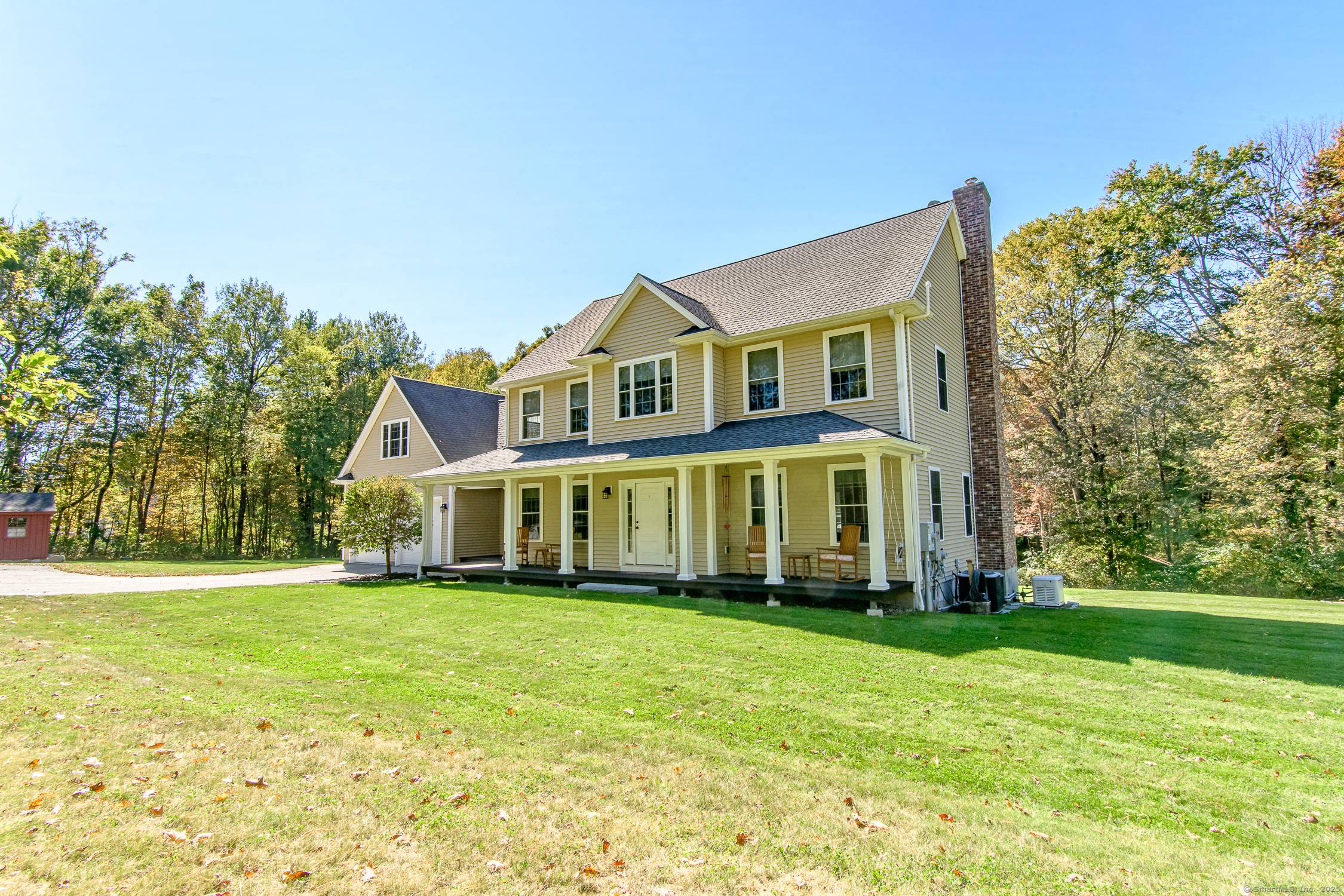 A beautifully maintained colonial nestled in one of Woodstock's most picturesque settings with many recent updates.