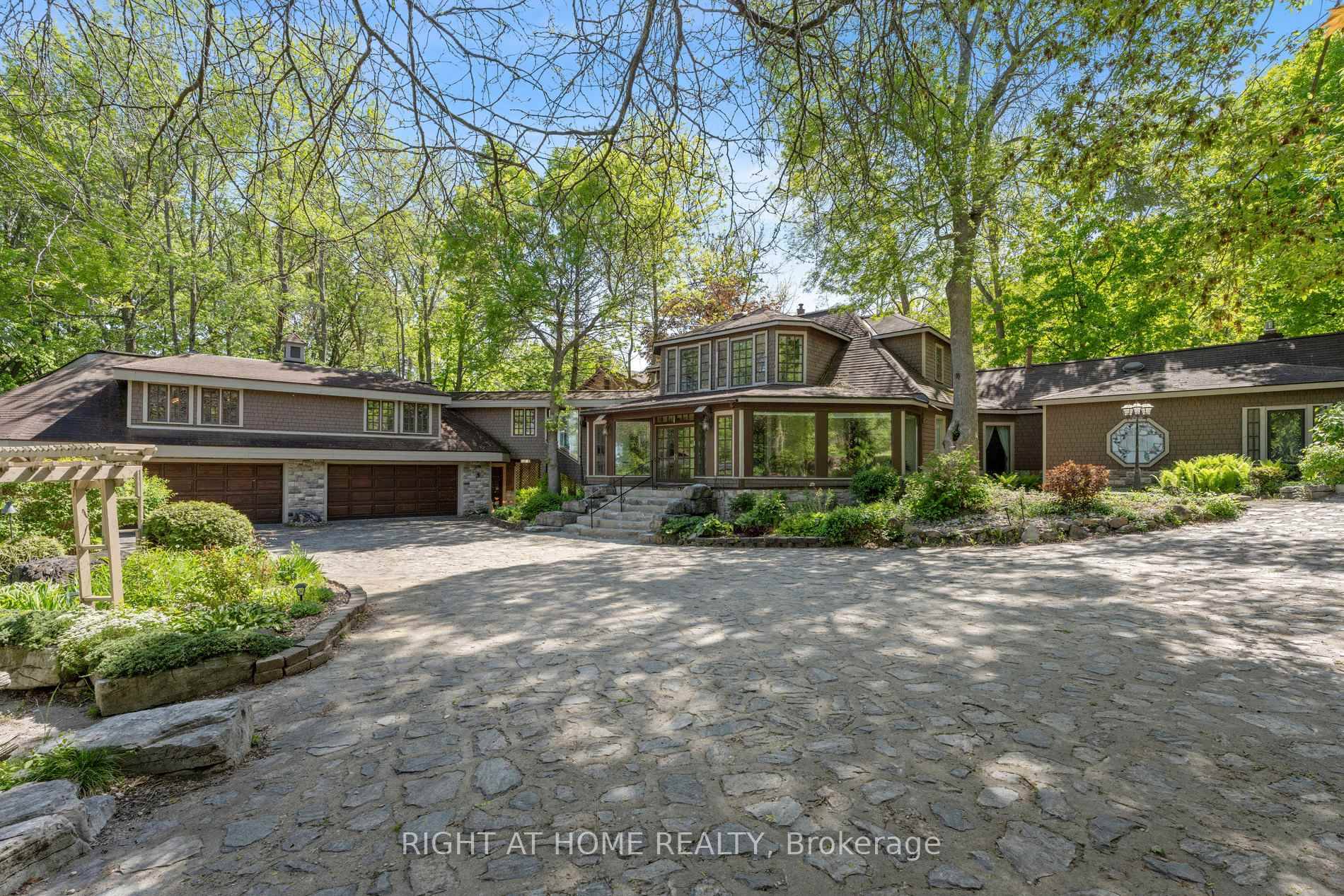 A charming, 1. 5 Storey house with nearly 97 feet of waterfrontage On Lake Couchiching ideally set upon the Old Brewery Bay.