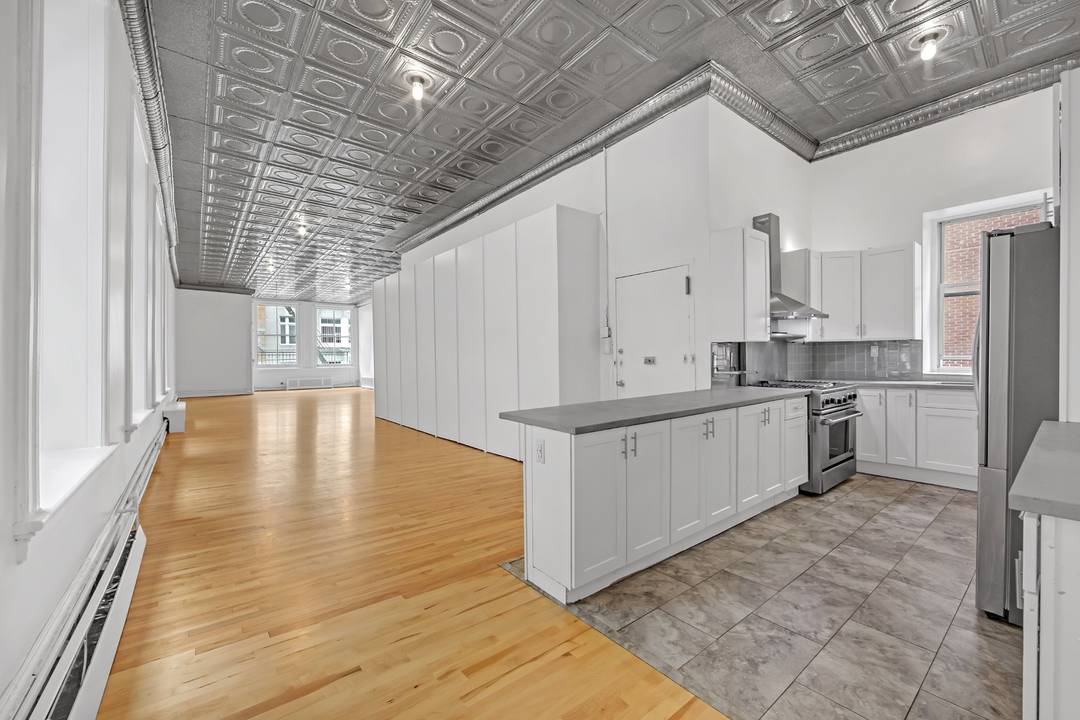 Expansive 2, 000 SF Authentic Loft in Prime SohoNestled in an iconic 1891 cast iron building on Grand Street between Wooster and Greene, this extraordinary 2, 000 square foot loft ...