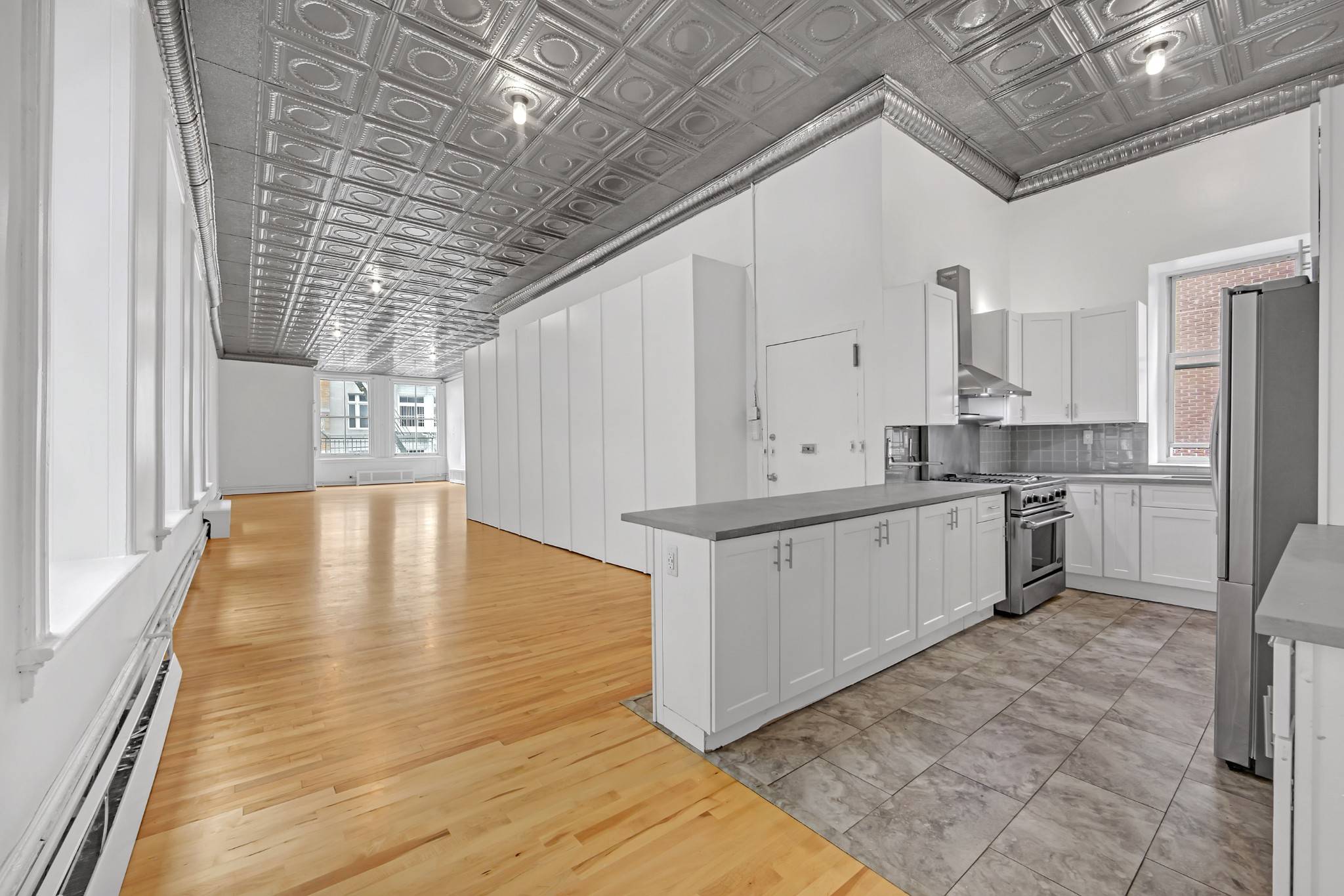 Expansive 2, 000 SF Authentic Loft in Prime SohoNestled in an iconic 1891 cast iron building on Grand Street between Wooster and Greene, this extraordinary 2, 000 square foot loft ...
