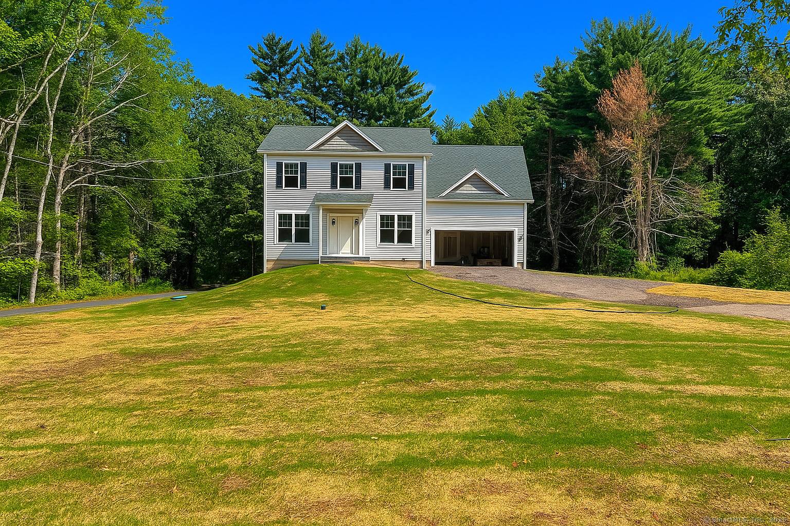 ALMOST COMPLETE ! New home construction by Cardwell Homes in a great Simsbury location.
