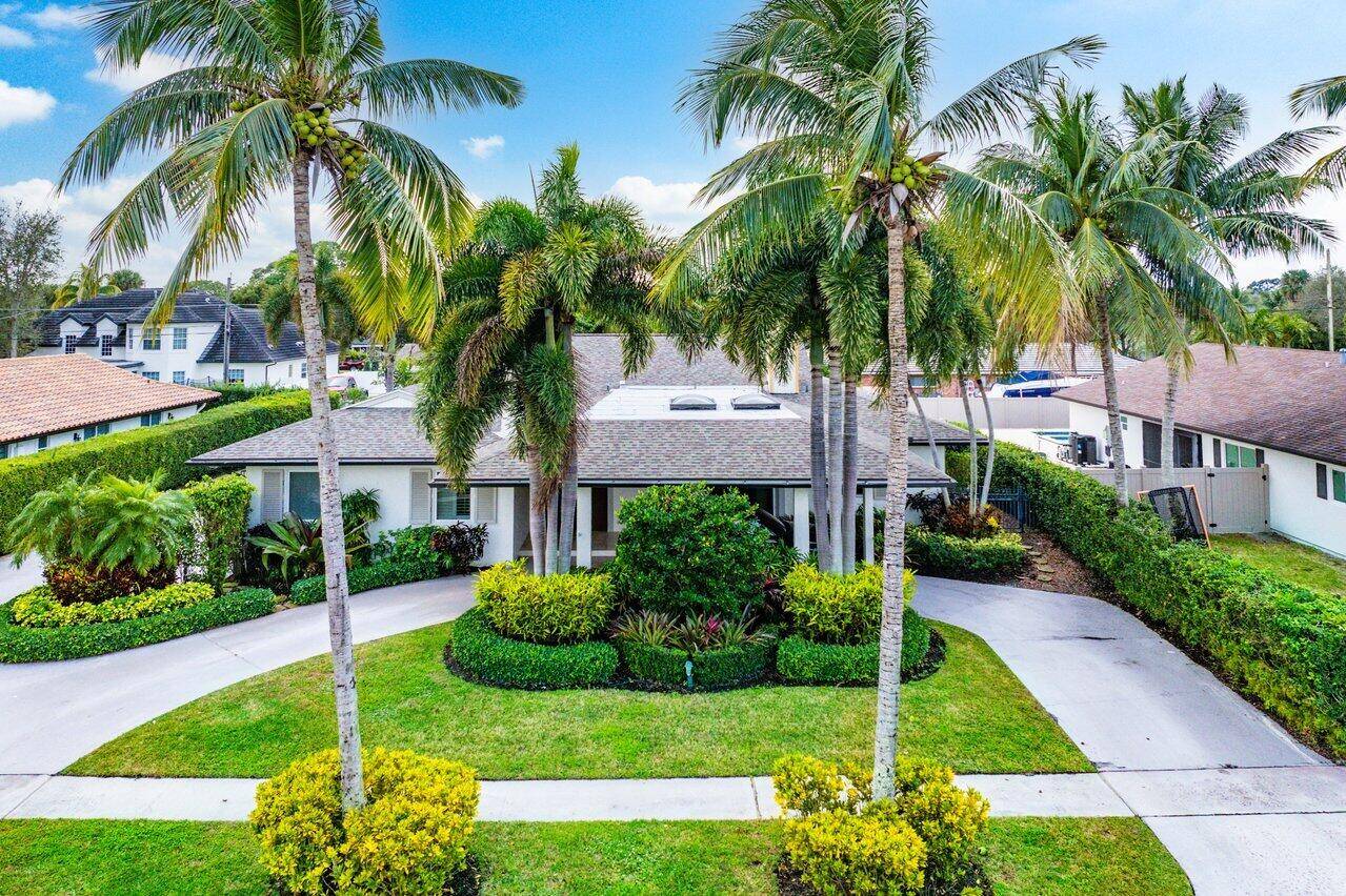 Located in the highly desirable Palm Beach Farms neighborhood of East Boca Raton, this beautiful 4 bedroom plus flex room currently a gym, home offers style, comfort, and practicality within ...
