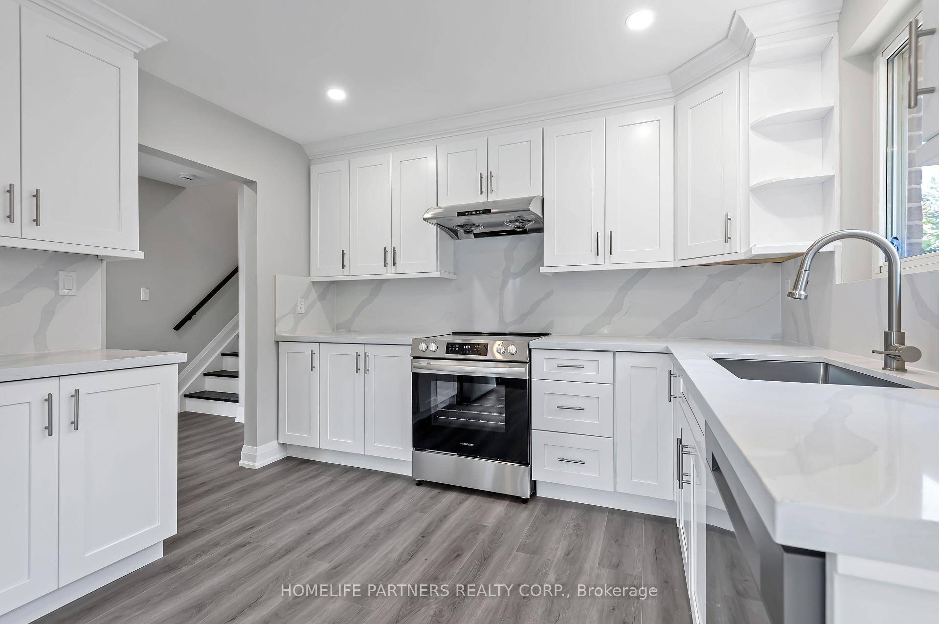 Must see ! ! ! Beautiful 3 bedroom property boasts a gorgeous chef's kitchen with quartz counter top and backsplash, high end stainless steel appliances and luxury vinyl flooring.