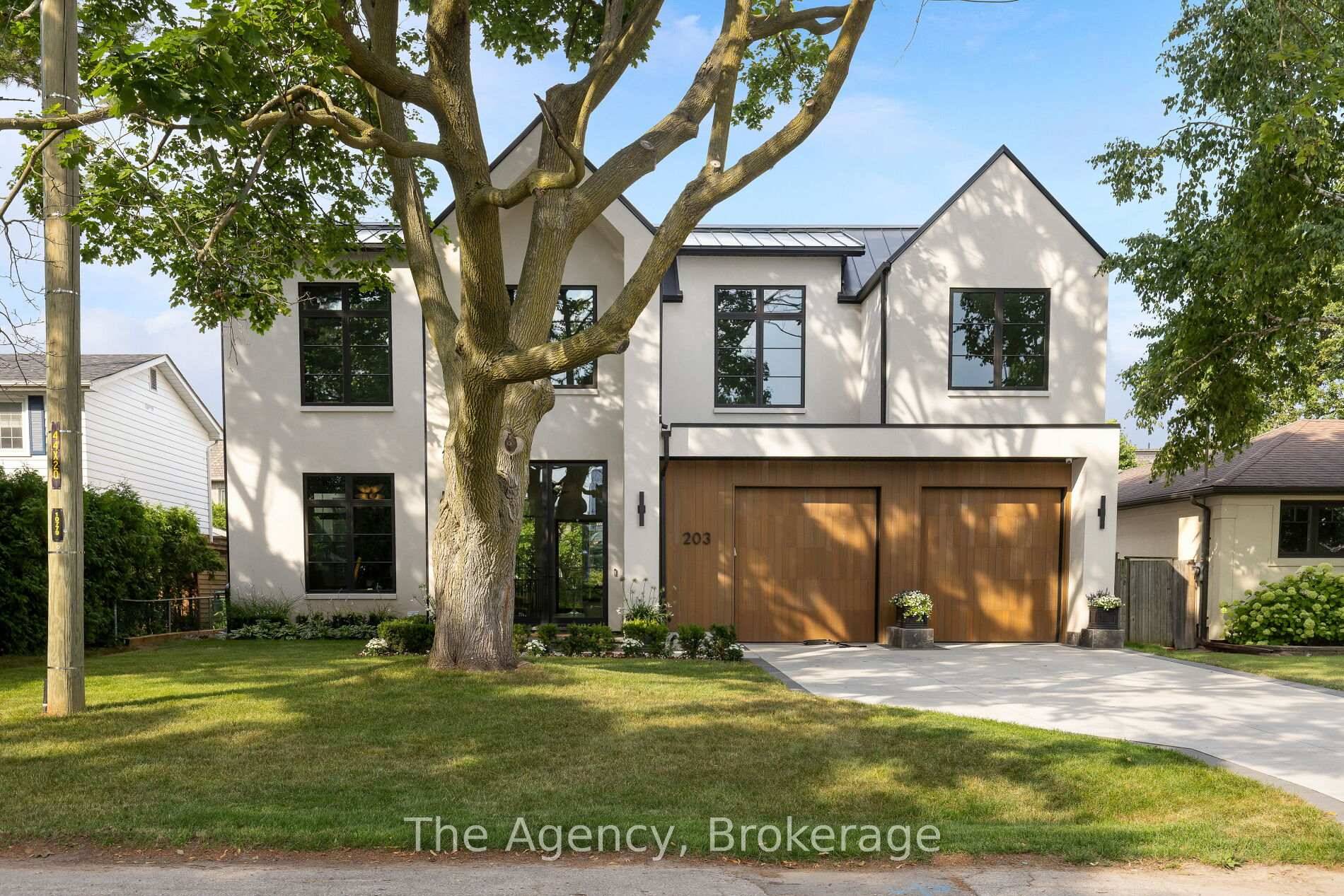 Set On A Coveted Street In South Oakville, 203 Weybourne Road Is A Rare Architectural Statement Where Old World Craftsmanship Meets New World Sophistication.